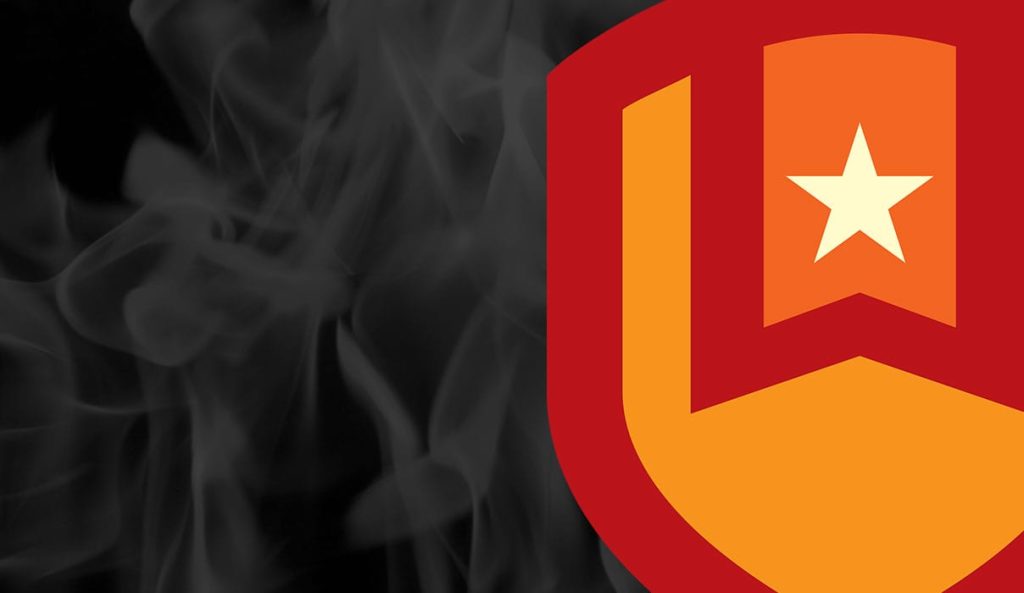 A red and orange shield emblem with a white star on an orange banner, shown on the right side of the image, with dark smoke swirling in the background on the left.