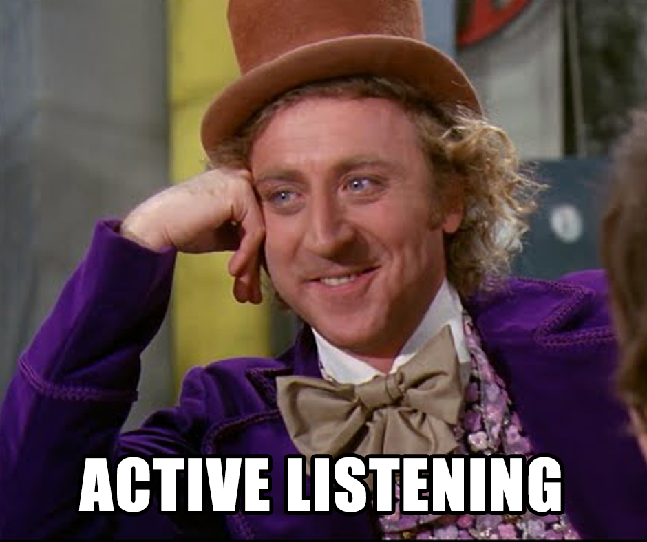 A man with curly hair, wearing a brown top hat and a purple velvet coat, leans his head on his hand and smiles sarcastically. White bold text at the bottom reads “ACTIVE LISTENING.”.