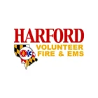 Logo for Harford Volunteer Fire & EMS, featuring bold red and gold text and an outline of Maryland filled with the state flag pattern and emergency service symbols.